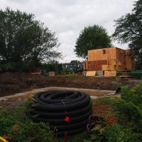 Notre maison au loin, et la maison des voisins en construction ( le gros trou devant).