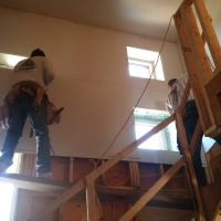 Installation des plaques de plâtres dans la cage d'escalier